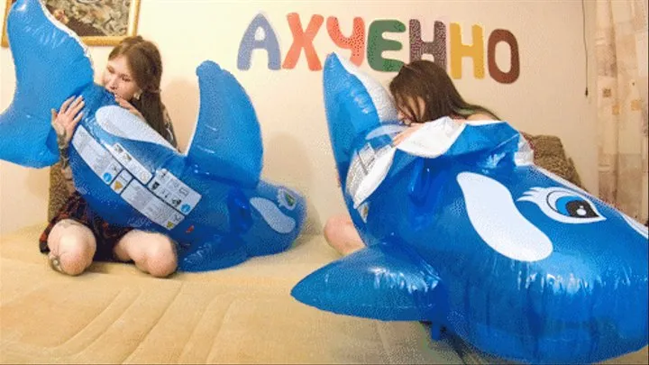 Q523 Ava and Leya blow, ride and deflate two blue Intex Dolphins