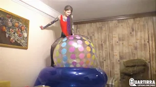 Q365 Ava rides big 48 inch beachball and pumps it to pop