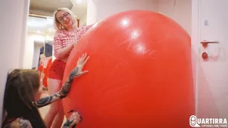 Q154 Ava and Lilu pumps to pop two huge red balloons