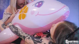 Q135 Ava and Lilu give love to inflatable dolphin