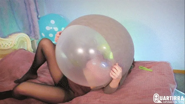 Q257 Leya blows and deflates big balloons under her sweater