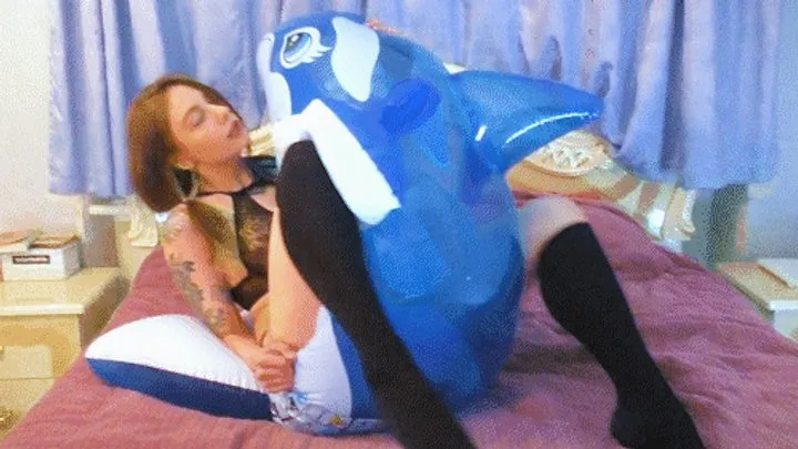 Q197 Ava watches Leya passionately riding and deflating blue Intex Dolphin