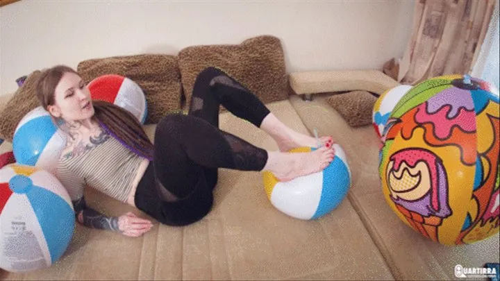 Q599 Ava deflates beachballs with bare feet