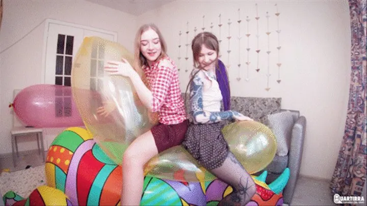 Q575 Ava and Kira sitpop balloons on a Rhino - 2K