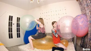 Q583 Ava and Kira blows to burst four Unique 24'' balloons