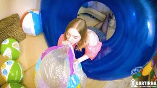 Q633 Kira blows big Intex beachball in a tube