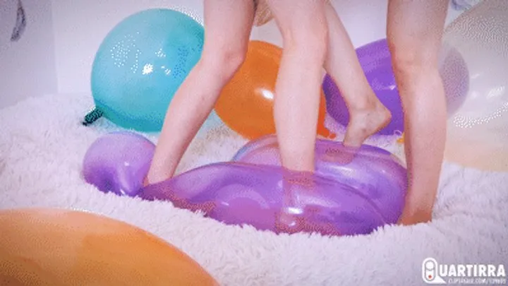 Q973 Four bare feet stomp many soft balloons to pop