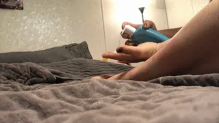 Rubbing lotion and toy on my feet