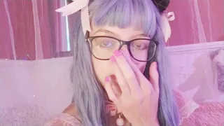 Cute kitten pinches her nose