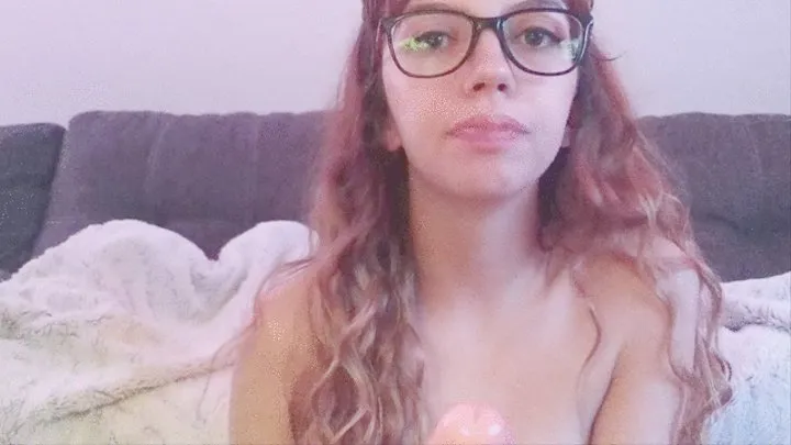 Cute girl sucks her dildo