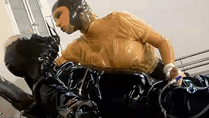 Latex clinic mistress, the rubber gas mask slave and the piss bladder catheter washout - Part 1 of 2