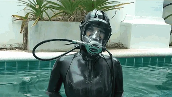 Sexy rubber girl in black latex catsuit and scuba gear - Swimming and diving in pool outdoor