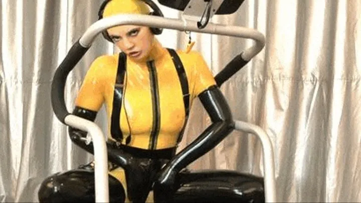 Sexy latex girl enjoys workout in a sweaty rubber catsuit