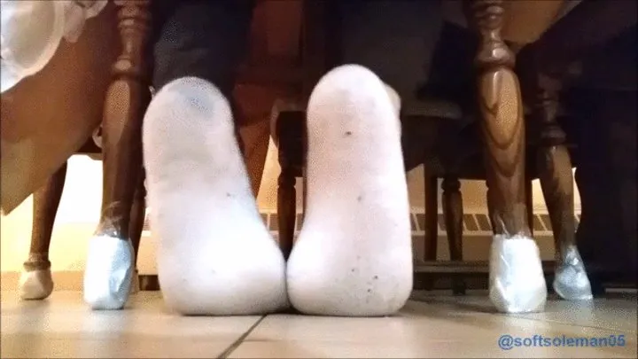 Soles are exposed under kitchen chair (2018)