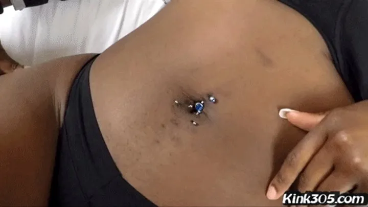 Mia Banx plays with her belly button