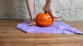 Pumpkin jack-o'-lantern crushed under my feet