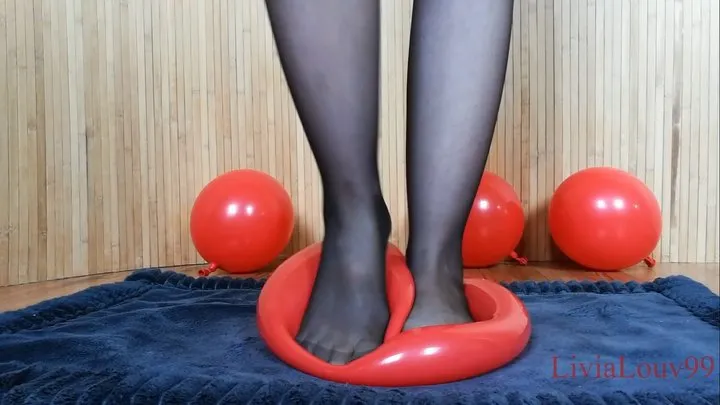 Both feet on balloons