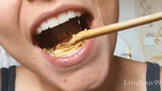 Biting and chewing wooden chopsticks