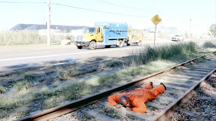 Punished on a live train track