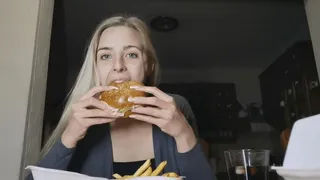 Eating big burger