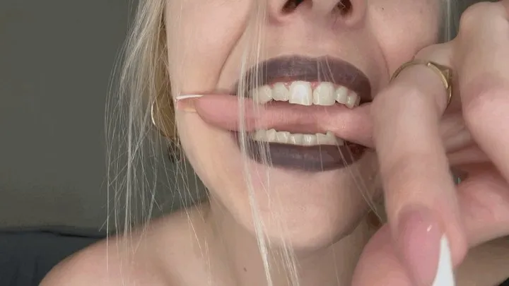 Pale girl biting