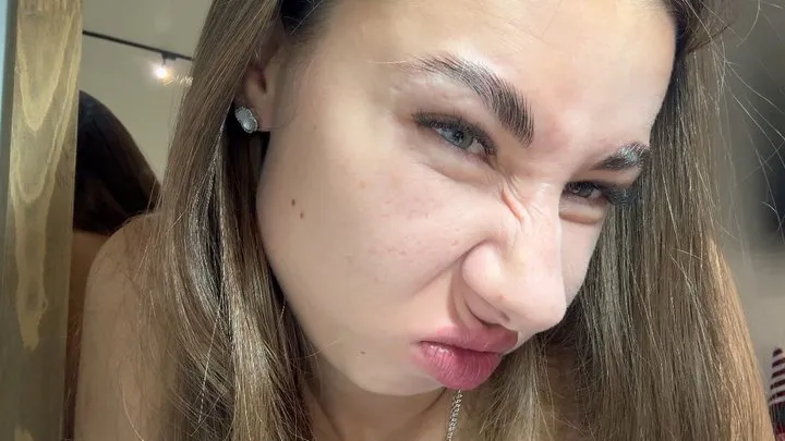 The girl tries to touch her nose with her lip, wrinkles her nose (custom video) part 2