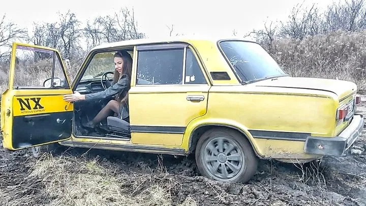 Girl stuck in the mud on an old yellow car (custom video)