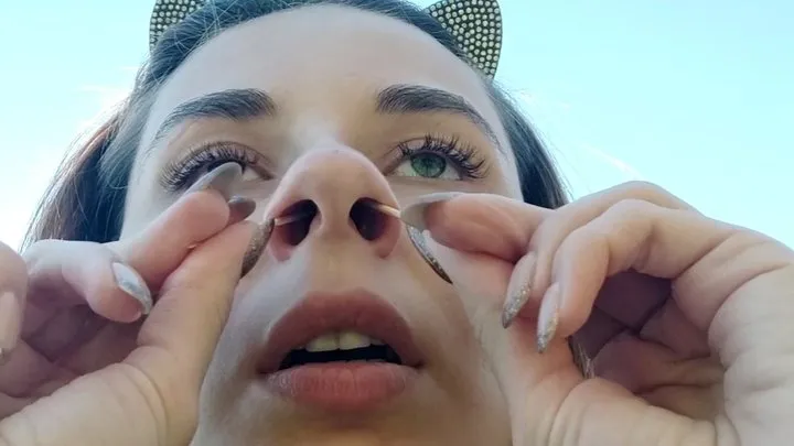 Girl sneezes looking at the sky with two toothpicks in her nostrils (custom video)