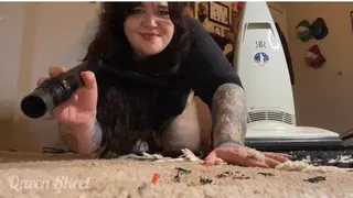 Giantess vacuums up tiny disobedient people
