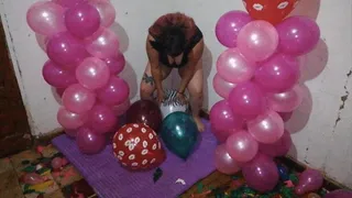 Sitting on big balloons