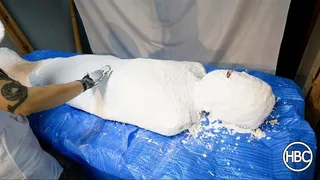 Plaster Man; Man Gets Mummified and Turned into a Statue