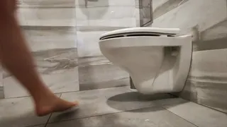 Barefoot in public toilet