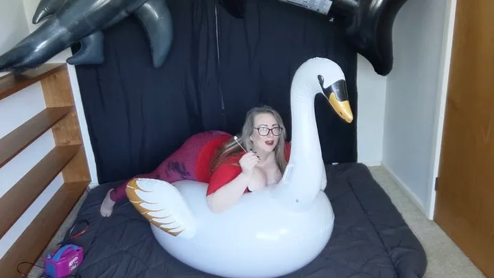 Inflatable Swan Overinflate and Pin Pop