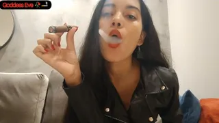 Smoking a cigar wearing leather jacket