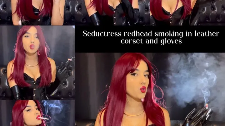 Seductress redhead smoking in leather corset and gloves