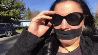 Blueheart Gagged in Public with Black Kinesio Tape