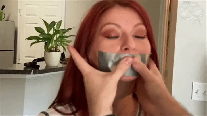 Lily Slow Mo Gagged with PVC Tape