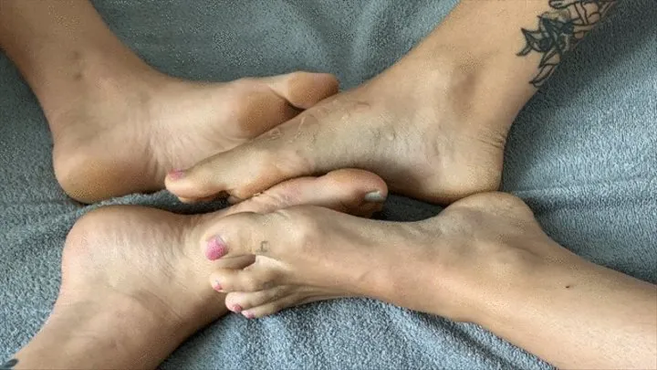 Two Dommes, One Oiled Footjob