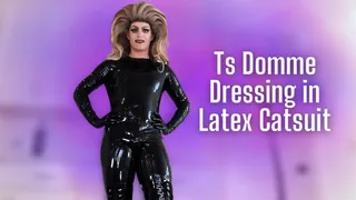 Ts Domme Dressing in Latex Catsuit