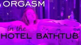 orgasm in the hotel bathtub