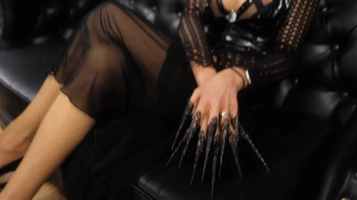 The lady teases with her nylons and hurts with her claws