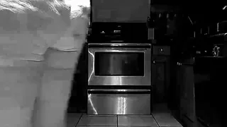 Chloe naked in the kitchen