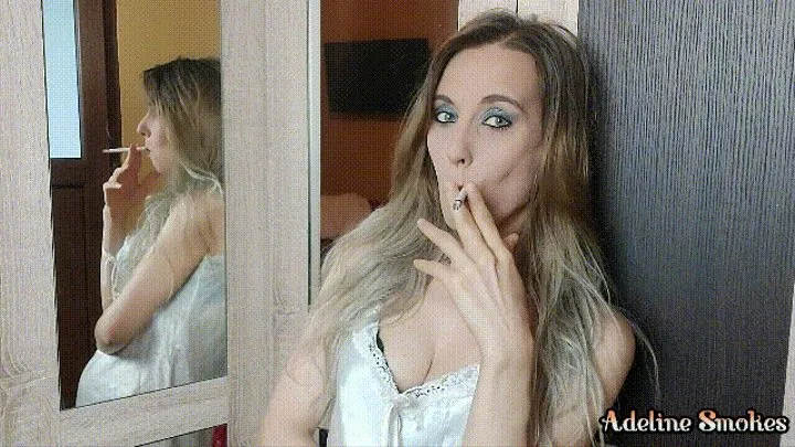 Smoking a cigarette in a satin dress