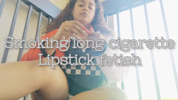 smoking long cigarette with red lipstick