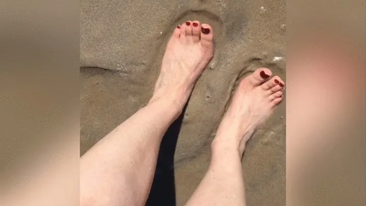 Squishing my cute size 7 feet in the sand