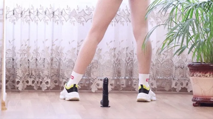 Fit girl in sneakers and socks Squats ended with dildo riding