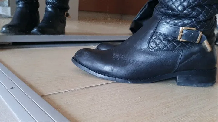 Close up Toe Tapping in Leather Boots and Guess Boots in front of a Mirror while Standing