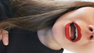 yawning in red lipstick