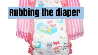 Rubbing the diaper