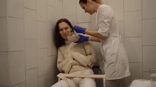 feeding a patient in a straitjacket